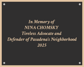 Memorial plaque for Nina Chomsky with text about her contributions to Pasadena's neighborhood.